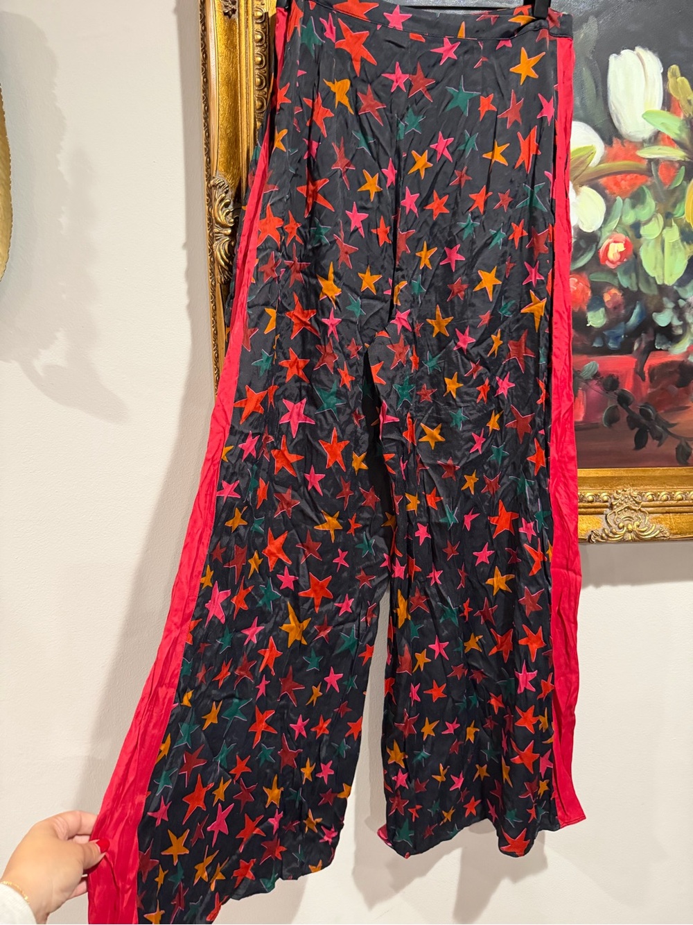FARM x Anthropologie Rio Black Wide-Leg Star Print Pants with Red & Orange Stars - Picture 4 of 8